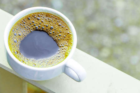 Cup of coffee with vintage tone style.