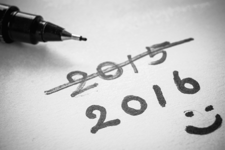 Pen close-up with New year 2016 sign with smile