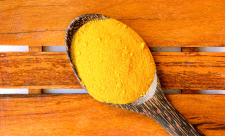 curcuma in wooden spoonの写真素材