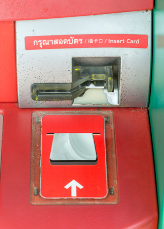 insert card ATM close-upの写真素材