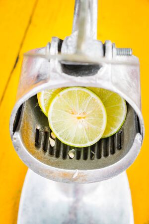 Lime slice with punch machineの写真素材