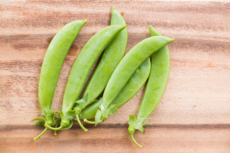 Pisum sativum on wooden