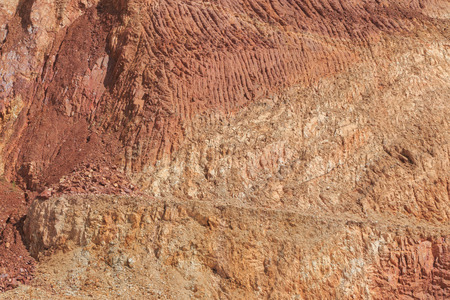 rock strata layers of the soil on broken mountainの写真素材