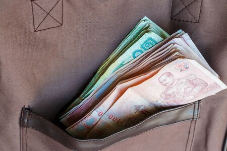 thai banknotes in the pocketの写真素材