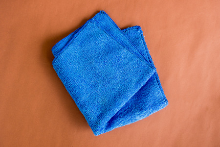 blue microfiber cloth for cleaning the carの写真素材