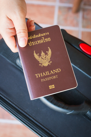 Thailand citizen passport on male handの写真素材