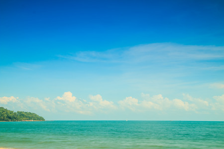 Clouds in the blue sky at the seaの写真素材