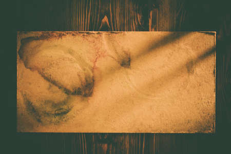 Blank paper on old wooden wall background for put your text.の写真素材