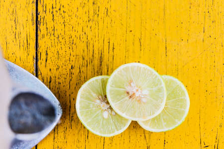 Lime slice with punch machineの写真素材