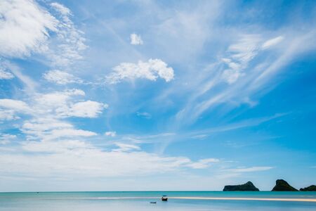 Peaceful beach, sand with blue-sky on summer time for relaxの写真素材