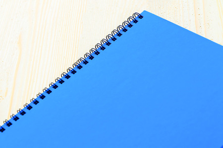 Blank paper on wooden background