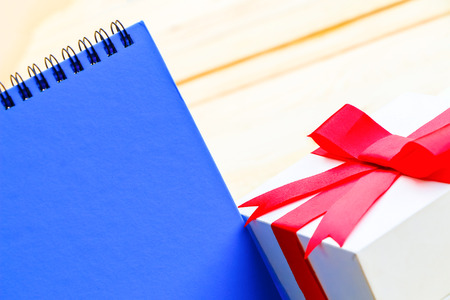 Blank paper on wooden background