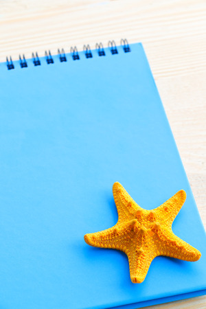 Blank paper on wooden backgroundの写真素材