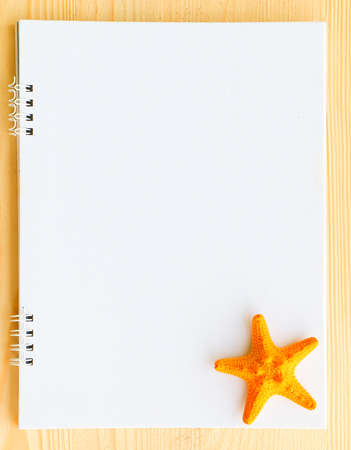 Blank paper on wooden backgroundの写真素材