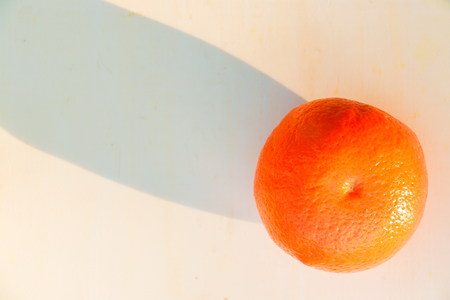 Orange fruits on wooden table, healthy fruit.の写真素材