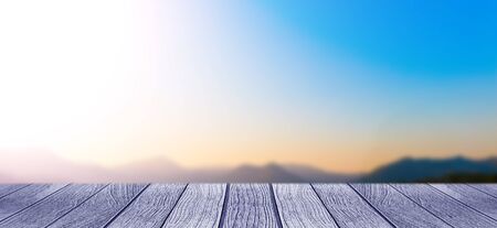 sunset background with empty plank under for put your products.