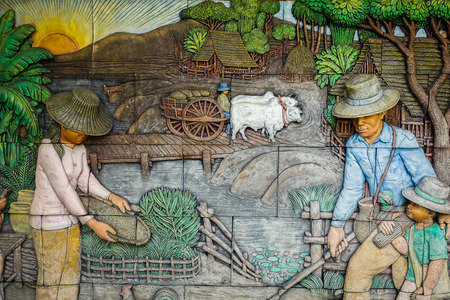 Picture of farmer craft on the stone at the public temple wallの写真素材