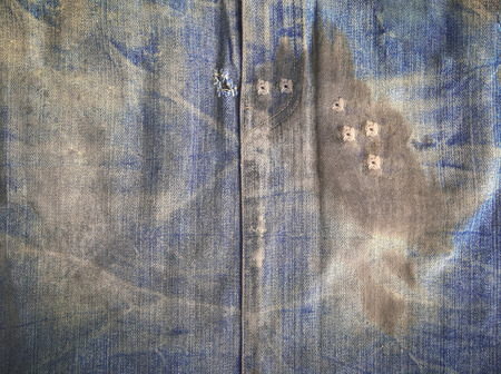 Close up dirty jean texture backgroundの写真素材