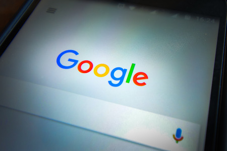 CHIANGMAI, THAILAND - MARCH 6, 2015: Google is an American multinational corporation specializing in Internet-related services and products. Most of its profits are derived from AdWords.のeditorial素材