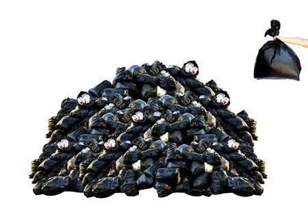 Human hand holding garbage bag with many garbage isolated on white backgroundの写真素材