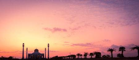 silhouette of mosque on sunset sky backgroundの写真素材