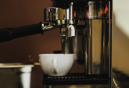 Close up process of preparation of coffee in the barの写真素材