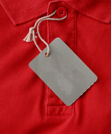 Close up top view of man polo shirt with blank tags use for texts displayの写真素材