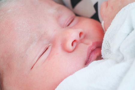 little child baby sleeping in bed