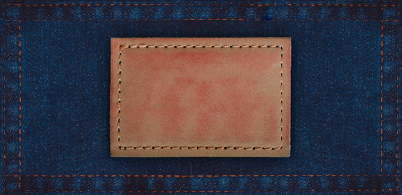 Close up denim jeans leather tags with blank space use for texts display