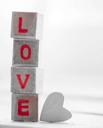 wooden blocks with LOVE word with background, Valentine's conceptの写真素材