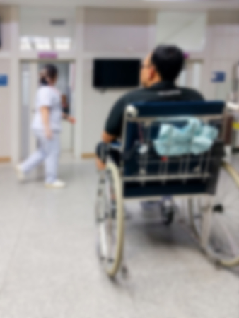 Blurred image of unidentify people waiting in hospital room for doctors or medecineの写真素材