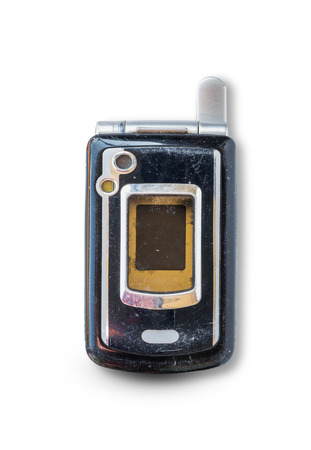Close up rustic vintage mobile phone isolated on white backgroundの写真素材