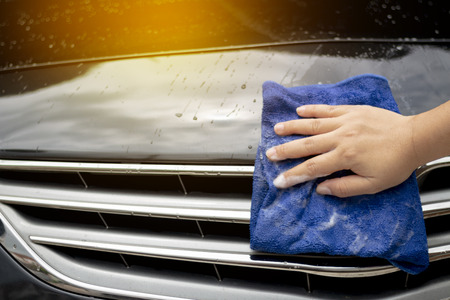 Close up people cleaning and wash the carの写真素材