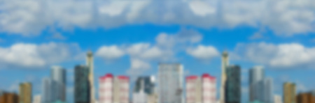 Landscape of blurred building with blue sky backgroundの写真素材