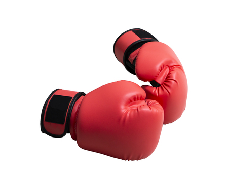 Close up red leather gauntlet boxing isolated on white backgroundの写真素材