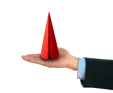 Close up paper airplane with isolated background and space use for texts or something displayの写真素材