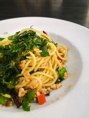 Close up spaghetti on white plate is italy foodの写真素材