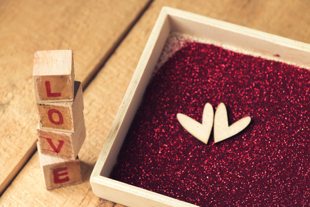 Close up LOVE text sign on wooden, Valentine's day concept.の写真素材