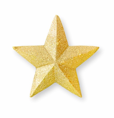 Close up golden glitter star isolated backgroundの写真素材