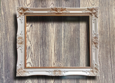 Close up rustic picture frame on wooden wall texture backgroundの写真素材