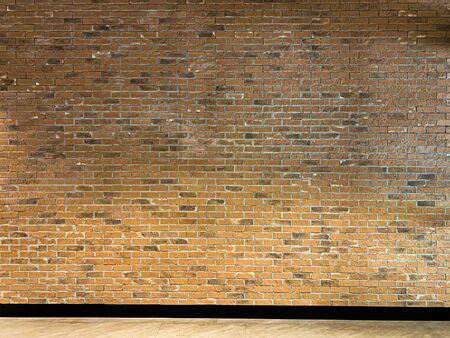Close up rustic brown old brick wall texture backgroundの写真素材