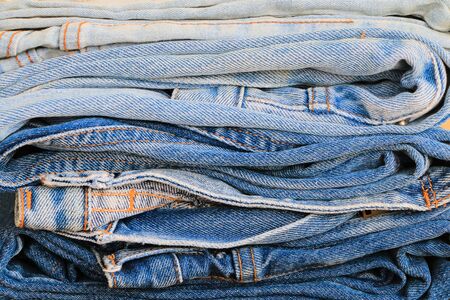 Close up group of jeans for sell at the shop pattern backgroundの写真素材