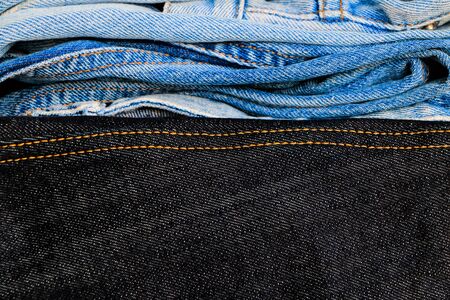 Close up group of jeans for sell at the shop pattern backgroundの写真素材