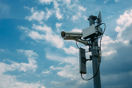 Security Cameras with Sky Backgroundの写真素材