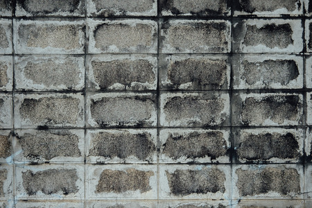 Old and Stained Exterior Brick Wallの写真素材