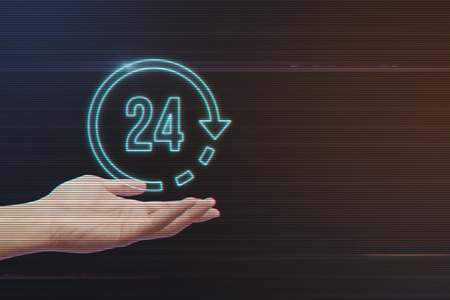 Human Hand Holding 24 Hours Icon on Light Motion Background and Lens Flare - Digital 3d Effect Style Colorの写真素材