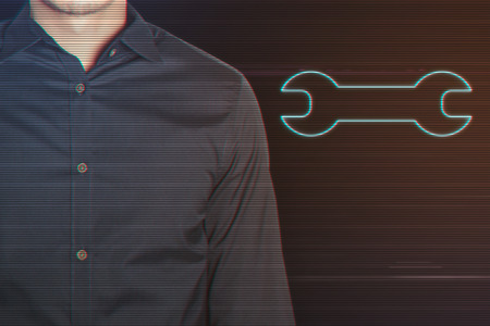 Young Businessman with Wrench Icon on Light Motion Background and Lens Flare - Digital 3d Effect Style Colorの写真素材