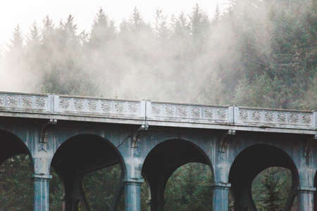 Gothic bridge in misty, rainy weather on the Oregon Coast.の写真素材