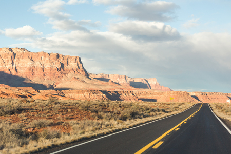 Remote desert highway landscape in northern Arizona, USA.の写真素材