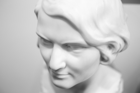 Bust or sculpture of a female person. Black and white photo.の写真素材